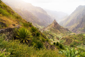 Santa Antao terrain at Cape Verde island. Mountain peaks of Xo-Xo valley with many local cultivated plantation near local village. Santa Antao terrain at Cape Verde island. Mountain peaks of Xo-Xo valley with many local cultivated plantation near local village.